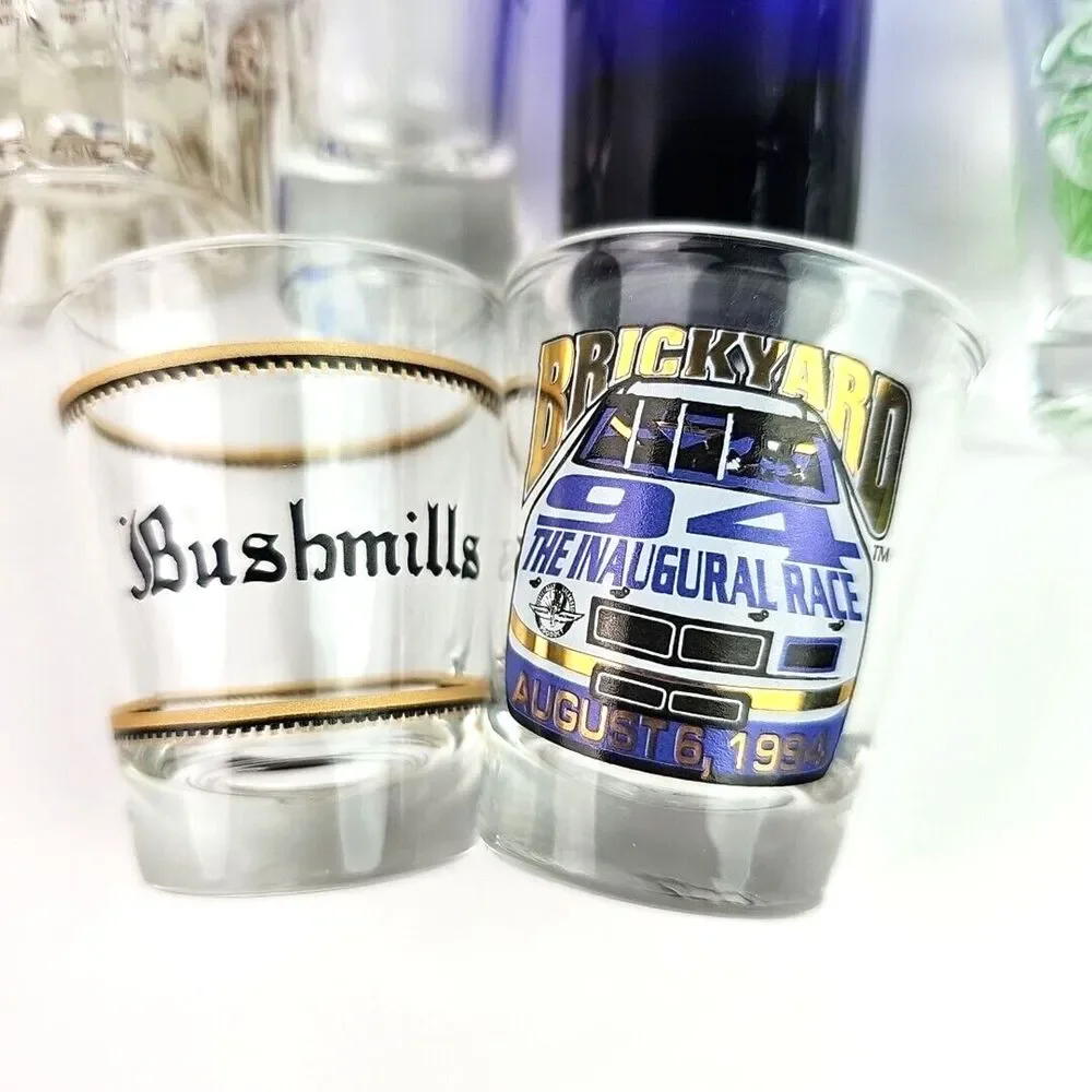 Lot of 11 Collectible Shot Glasses Smirnoff Bushmills Sauza Hornitos Brickyard